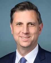 Official portrait of Seth Magaziner