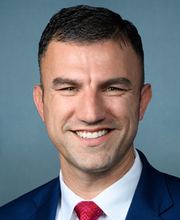 Official portrait of Rudy Yakym III